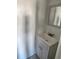 Bathroom featuring a vanity with modern fixtures and a framed mirror at 3241 E 84Th Dr, Thornton, CO 80229