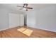 Spacious bedroom with hardwood floors and ceiling fan at 6441 S Eudora Way, Centennial, CO 80121