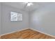 Bedroom featuring hardwood floors and ceiling fan at 6441 S Eudora Way, Centennial, CO 80121