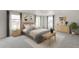 Cozy bedroom with a comfortable bed, neutral tones, and ample natural light at 840 Leeward St, Lochbuie, CO 80603