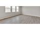 Bright, airy living space with large windows allowing for plenty of natural light at 840 Leeward St, Lochbuie, CO 80603