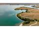 Beautiful aerial view showcasing a pristine lake with winding paths and natural shoreline at 5189 S Malta Way, Centennial, CO 80015