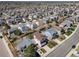 Expansive aerial view showcasing the neighborhood with neatly arranged houses and well-maintained lawns at 5189 S Malta Way, Centennial, CO 80015