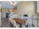 Dining room area with view of stairs, fireplace, and main level at 5189 S Malta Way, Centennial, CO 80015