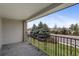 Inviting balcony with decorative railing offering outdoor space and neighborhood views at 6711 S Race St, Centennial, CO 80122