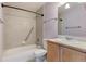 This bathroom has a shower and tub combination with a single sink vanity at 6711 S Race St, Centennial, CO 80122