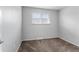 This bedroom features carpeted floors, a window and neutral walls at 6711 S Race St, Centennial, CO 80122