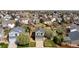 Aerial view of a home with a lush front lawn, mature trees, and a well-manicured landscape at 5324 S Malta Way, Centennial, CO 80015