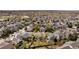 Wide aerial view of a neighborhood filled with houses and mature trees at 5324 S Malta Way, Centennial, CO 80015