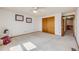 Bedroom with closet, carpet, and ceiling fan at 10436 W 84Th Pl, Arvada, CO 80005