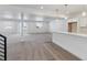 Finished basement with carpeted floors and wet bar at 5091 Hickory Oaks St, Castle Rock, CO 80104