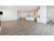 Spacious living room with hardwood floors and an open floor plan at 5091 Hickory Oaks St, Castle Rock, CO 80104