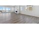 Spacious living area with fireplace and access to deck at 5091 Hickory Oaks St, Castle Rock, CO 80104