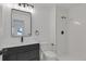 Modern bathroom featuring sleek fixtures and a tiled shower at 1260 Ascot Ave, Highlands Ranch, CO 80126