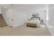 Bright bedroom with staircase, closet, and natural light at 1260 Ascot Ave, Highlands Ranch, CO 80126