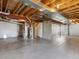 Unfinished basement with concrete floor and exposed ceiling, ready for customization at 4816 S Elk Way, Aurora, CO 80016