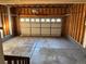 Spacious garage with natural light entering through the windows, and neutral colors at 4816 S Elk Way, Aurora, CO 80016