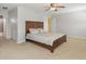The main bedroom features a ceiling fan and closet with easy access to other rooms at 4816 S Elk Way, Aurora, CO 80016