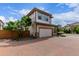 Charming home with a two-car garage, nicely landscaped front yard, and a brick driveway at 10580 Waco St, Commerce City, CO 80022