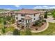 Aerial view of home with outdoor living space, and beautiful water feature at 7724 Kryptonite Ln, Castle Rock, CO 80108