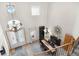 Open foyer with high ceilings, chandelier, and a view of the dining area at 7724 Kryptonite Ln, Castle Rock, CO 80108