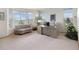 Spacious office with large windows, neutral carpet, and a stylish desk setup at 7724 Kryptonite Ln, Castle Rock, CO 80108
