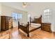 Bedroom with hardwood floors and wood furniture at 7746 S Joplin Ct, Englewood, CO 80112