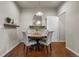 Inviting dining room with a round table, comfortable seating, and contemporary decor at 9071 E Phillips Dr, Centennial, CO 80112