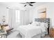 Bright bedroom with a comfortable bed, stylish headboard, and inviting natural light at 1415 N Washington St # 303, Denver, CO 80203