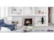 Cozy living room featuring a fireplace with decorative mantel, creating a warm and inviting atmosphere at 1415 N Washington St # 303, Denver, CO 80203