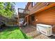 Exterior view features generator, fenced area and multi-story home at 29825 Kennedy Gulch Rd, Conifer, CO 80433