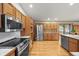 Well-equipped kitchen with modern appliances, generous counter space, and beautiful wood cabinetry at 29825 Kennedy Gulch Rd, Conifer, CO 80433