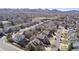 Expansive aerial view of a residential area with neat streets and mountain views at 11722 W Belmont Pl, Littleton, CO 80127