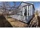 Large deck perfect for outdoor entertaining in a private backyard setting at 11722 W Belmont Pl, Littleton, CO 80127