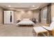Finished basement bedroom with recessed lighting, plush carpet, and stylish, modern decor and furniture at 11722 W Belmont Pl, Littleton, CO 80127