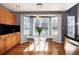 Kitchen breakfast nook with sliding doors to the deck and pendant lighting at 11722 W Belmont Pl, Littleton, CO 80127