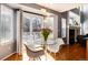 Breakfast nook with pendant lighting and a door to the backyard and fireplace at 11722 W Belmont Pl, Littleton, CO 80127