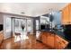 Bright kitchen with updated appliances, wood floors, and an eat-in breakfast nook at 11722 W Belmont Pl, Littleton, CO 80127