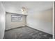 Bedroom with neutral paint, new carpet, and ample natural light at 1791 Quail St, Lakewood, CO 80215