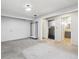 Finished basement area with laundry and bathroom visible through doorways at 8510 Union Cir, Arvada, CO 80005