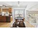 Bright dining area with natural light, featuring a table with seating for four and seamless connection to the kitchen at 8510 Union Cir, Arvada, CO 80005