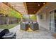 Covered back patio featuring outdoor furniture and a grill at 8510 Union Cir, Arvada, CO 80005