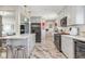 Modern kitchen with stainless steel appliances and island at 2916 Ivanhoe St, Denver, CO 80207