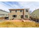 Spacious backyard featuring a patio perfect for entertaining and a well-maintained lawn at 9703 Ogden Ct, Thornton, CO 80229