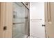 Bathroom with a stand up shower with glass doors at 9703 Ogden Ct, Thornton, CO 80229
