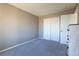 Bedroom with carpet, a closet with double doors and neutral colored walls at 9703 Ogden Ct, Thornton, CO 80229