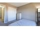Bedroom with carpet, dresser and a closet with sliding doors at 9703 Ogden Ct, Thornton, CO 80229