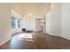 Spacious living room with tiled floors, soaring ceilings, and plentiful natural light at 9703 Ogden Ct, Thornton, CO 80229