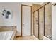 Modern bathroom with a large walk-in shower at 10132 Inverness Main St, Englewood, CO 80112