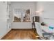 Bright home office with hardwood floors and built-in shelving at 10132 Inverness Main St, Englewood, CO 80112